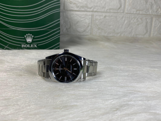 Rolex Oyster Perpetual Silver Dial – Classic Luxury Redefined