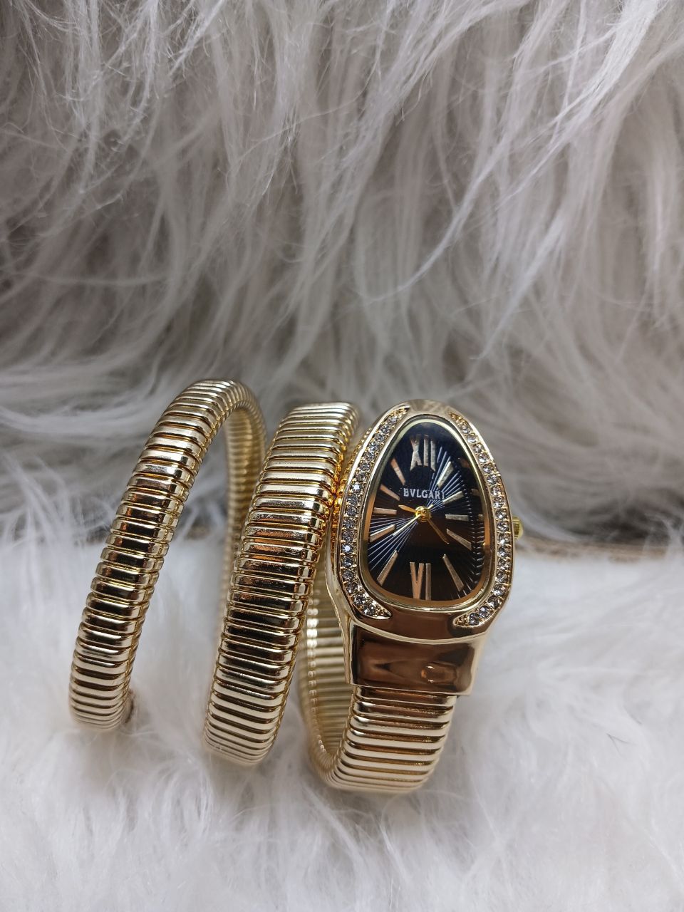 ساعة على شكل ثعبان